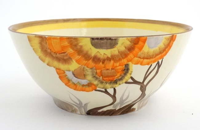 A c1930's Clarice Cliff '' Rhondanthe '' pattern bowl hand painted in yellow, orange,