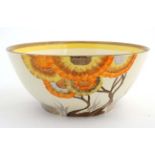 A c1930's Clarice Cliff '' Rhondanthe '' pattern bowl hand painted in yellow, orange,