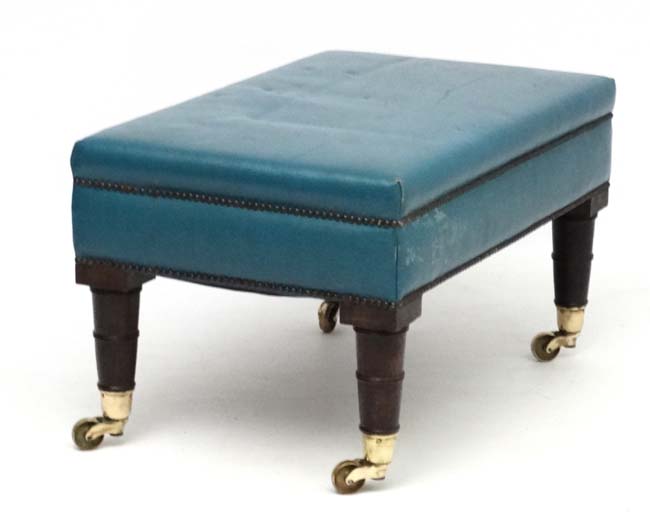 An 18thC style leather upholstered four legged stool on castors. - Image 2 of 4