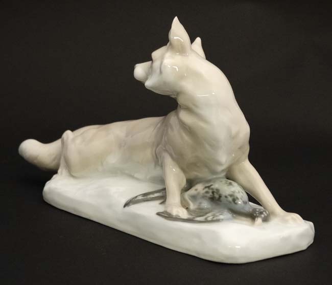 A figurine modelled as a fox with duck at its feet, - Image 3 of 6