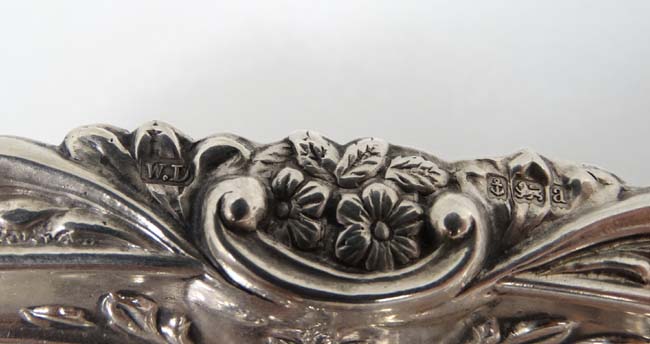A matched pair of silver dishes with embossed floral and scroll decoration. - Image 4 of 5