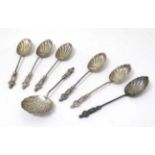 A set of 6 teaspoons with scallop shell formed bowls with twist handles surmounted by figural