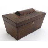 An early 19thC rosewood sarcophagus shaped tea caddy 10 3/4" wide x 5 5/8" deep x 6" high