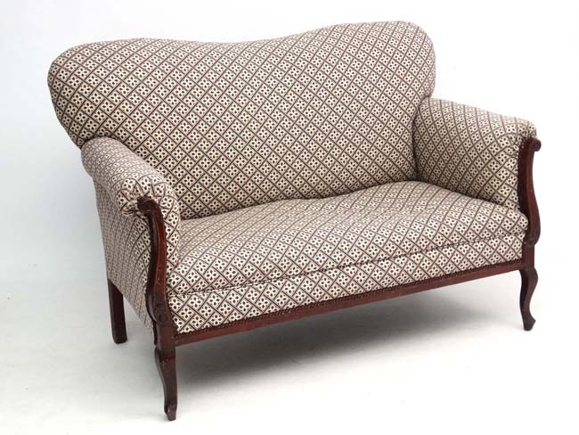 An Edwardian inlaid mahogany 2 seater sofa,