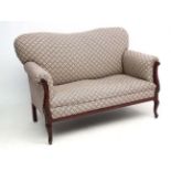 An Edwardian inlaid mahogany 2 seater sofa,