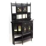 Aesthetic Movement : a 19thC hand painted and bevelled mirror back ebonised side cabinet with