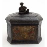 A lead tobacco box and tamper,