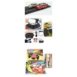 A collection of three boxed Scalextric sets,