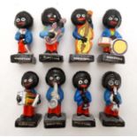 A collection of 8 c1960s handpainted Golly band members, produced for Robertson's English Jam Co,