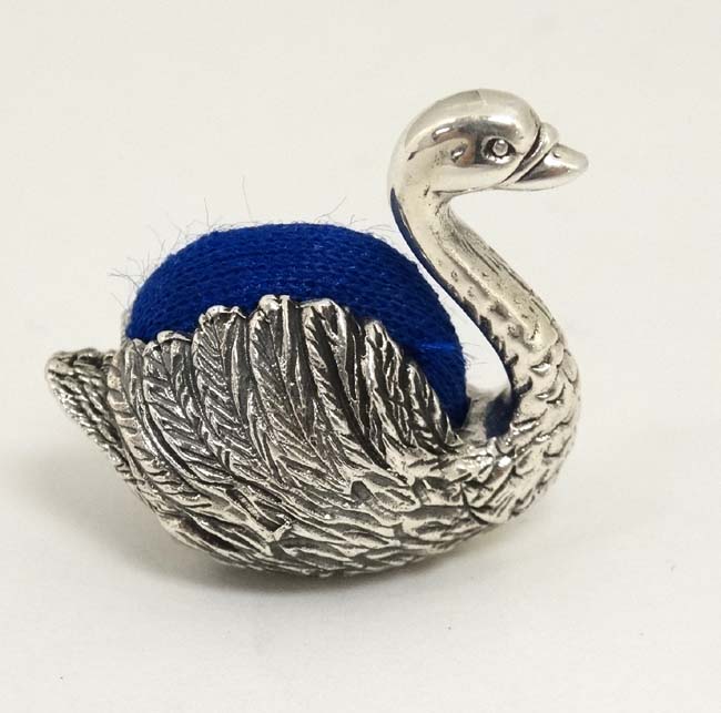 A novelty white metal pin cushion formed as a swan 1" high CONDITION: Please Note - - Image 3 of 3