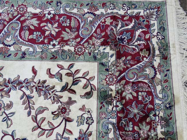 Carpet / Rug : a Tabriz machine made beige ground carpet, with sage green ground central medallion, - Image 8 of 8
