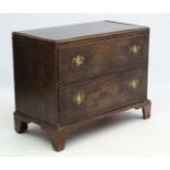 A 19thC oak 2 drawer chest ( formerly the lower part of a chest on chest ) 20" deep x 39" wide x