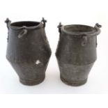 A pair of early 20thC well buckets of galvanized riveted steel construction.