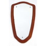 Vintage Retro : a 1960's teak framed wall mirror of shaped form,