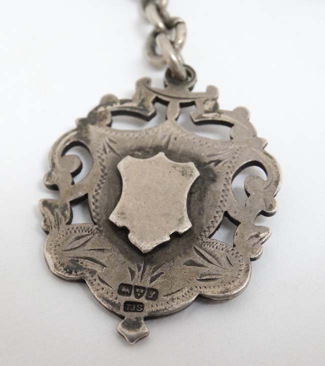 A silver albert watch chain with Hallmarked silver fob The fob Hallmarked Chester 1911 maker TJS. - Image 2 of 4