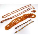 Assorted jewellery including a silver and amber cabachon bracelets,