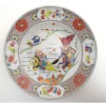 A Chinese bowl decorated in polychrome enamels with warring figures on horse back to well ,