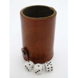 A Sheldon style leather dice shaker / cup having dice storage section to base,