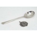 A silver preserve spoon hallmarked Sheffield 1910 maker Cooper Brothers & Sons Ltd. 4 3/4" long.