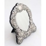 A silver mounted easel back table mirror with silver surround hallmarked Sheffield 1990 maker