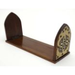 A Victorian Gothic Revival lancet shaped folding walnut book slide.