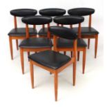 Vintage Retro : a set of 6 teak dining chairs with black vinyl covered seats and shaped back rests
