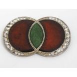 Vintage Costume Jewellery: An Art Deco brooch with green and red enamel decoration and white stone