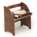 Art Deco : a limed oak Heals style low chair with patterned upholstered seat,