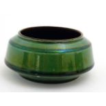 A small '' Watcombe '' Torquay green lustre pot, number 1476, bears inscribed mark to base.
