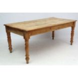 A Victorian stripped pine kitchen table 72" long x 35" wide x 29 1/2" high CONDITION: