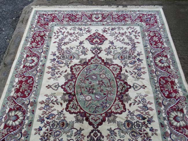 Carpet / Rug : a Tabriz machine made beige ground carpet, with sage green ground central medallion, - Image 2 of 8