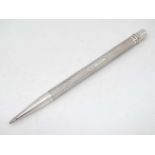 Mordan Everpoint : A silver pencil with engine turned decoration.