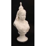 A 21stC composite marble bust of queen Victoria on a circular socle 15 1/2" high