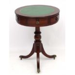 A mid - late 20thC 6-drawer mahogany tripod drum table 20" diameter x 26 1/2" high