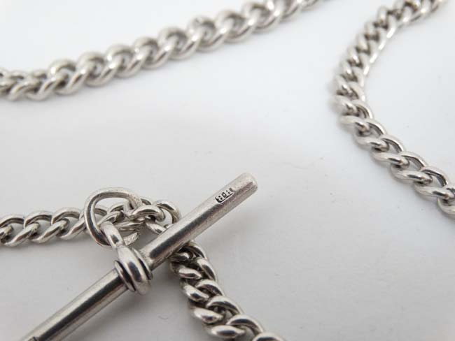 A silver albert watch chain of graduated curblink form with silver fob engraved 1906-7 Salisbury - Image 2 of 3