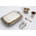 A assorted silver plated wares to include entree dish and cover, toast rack, cream jug,