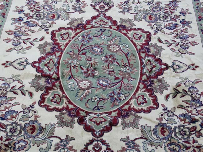 Carpet / Rug : a Tabriz machine made beige ground carpet, with sage green ground central medallion, - Image 4 of 8