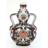 A two handled double gourd vase decorated in a wucai style,