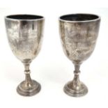 A pair of silver trophy cups engraved ' St Albans Lawn Tennis Charity Assocn.....