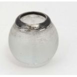 A glass table top vesta of spherical form with ribbed match striker body and silver rim hallmarked