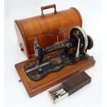 Cased singer sewing machine CONDITION: Please Note - we do not make reference to