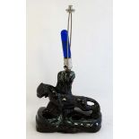 A mid 20thC desk lamp base formed as a Black Panther with inkwells approx 11" wide x 21" high