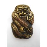 A late 20thC brass vesta case formed as stylized monkey CONDITION: Please Note -