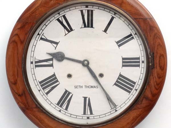 Seth Thomas 12" wall Clock : a walnut cased 8 day wall clock, formerly striking on two gongs, - Image 2 of 3