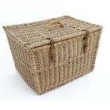 A wicker pigeon carrier with leather straps 19" wide x 14" deep x 12" high CONDITION: