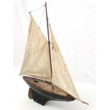 An early 20thC wooden gaff rigged sloop Pond Yacht having brown painted wooden keel ,