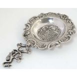 A Dutch silver tea strainer with bird decoration to handle 5 3/4" long CONDITION: