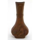 Art Nouveau : A c.1900 Coppered slab sided bottle vase having relief fairy decoration.