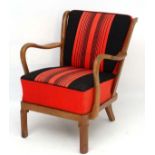 Vintage Retro : a Danish 1940's lounge chair with dark blonde oak open arms and shaped stick back,