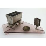 An early - mid 20thC nickel and perspex smokers companion comprising matchbox stand,